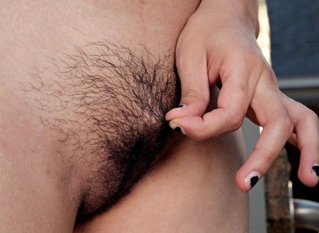 Lovely exotic Nenetl shares her natural coochie on the roof - 13 of 16