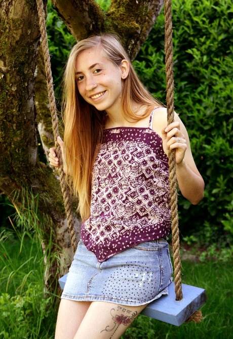 Skinny teen Nessa spreads her shaggy crotch on a swing - 1 of 16