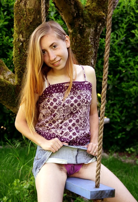 Skinny teen Nessa spreads her shaggy crotch on a swing - 4 of 16