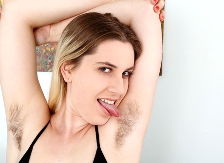 Dirty blonde Niki licks her hairy pits and spreads her bush - 3 of 16