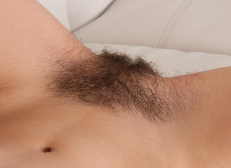 Hairy babe Olive fingering furry pussy hole on couch - 10 of 16