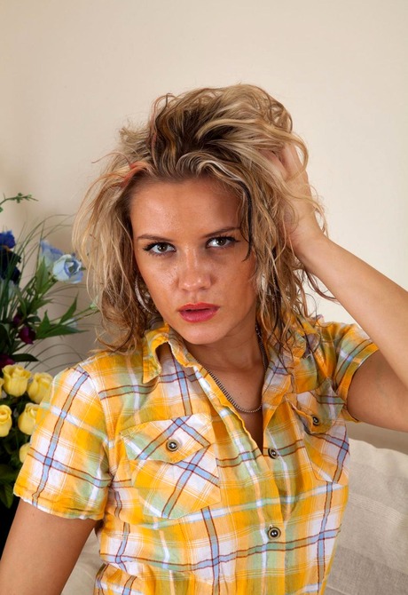 Regina strips and bends over to spread her fluffy muff open - 6 of 15