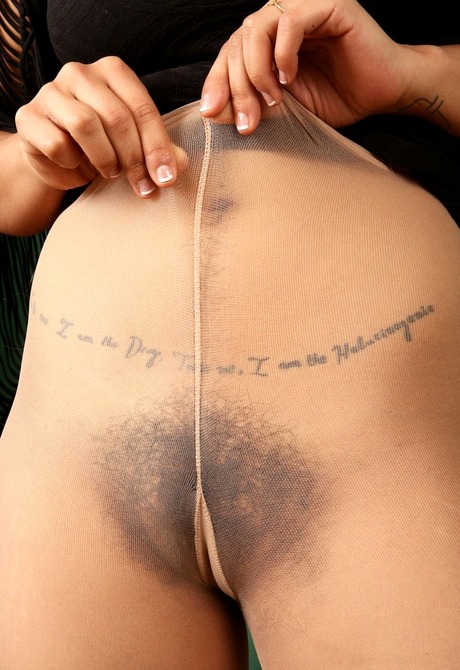 Exotic hairy amateur Rhys Adams teasing in pantyhose - 7 of 16