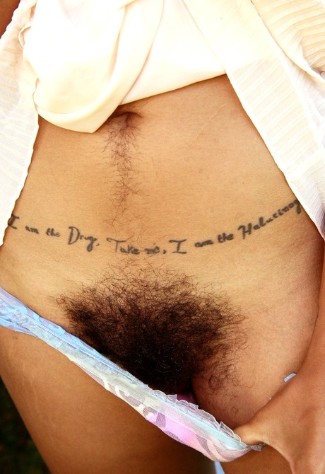 Hairy asian showing her sweet muff on swing outdoors - 5 of 16