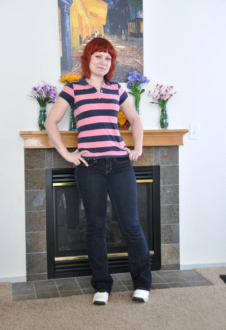 Natural redhead Sadie gets naked and spreads her hairy twat