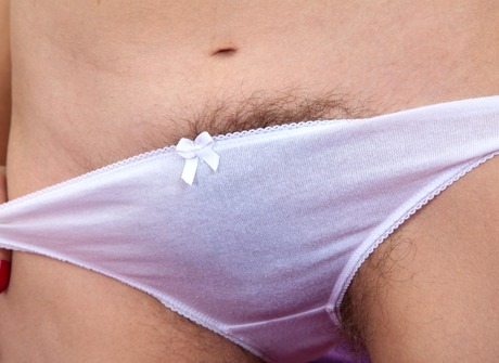 Skinny hairy brunette Sadie showing furry legs and pussy - 10 of 16