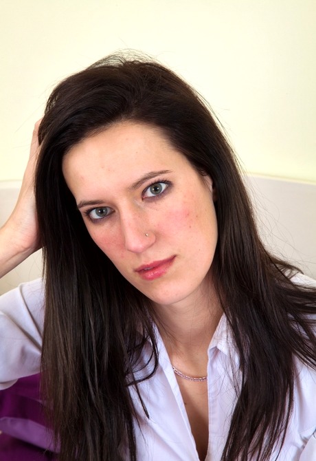 Skinny hairy brunette Sadie showing furry legs and pussy