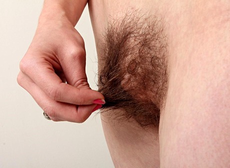 Sensual Sammy pulls down her panties and fondles her snatch - 9 of 15