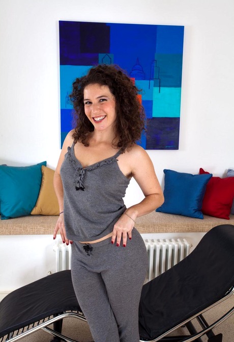 Naughty brunette Sativa flaunts and spreads her sexy muff - 3 of 15