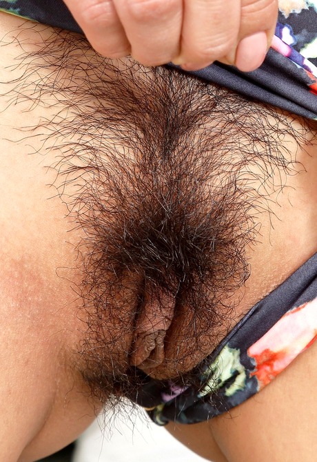 Asian hottie Saya pleasures her thick snatch with a dildo - 5 of 16