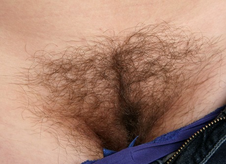 Nerdy babe Skyler shares her furry pits and unshaved crotch - 8 of 16