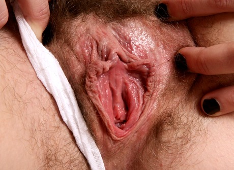 Snow gets horny in the kitchen and shows off her furry bush - 9 of 16