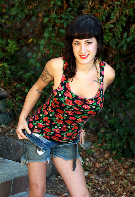 Hairy tattooed amateur Stacey showing her muff outdoors