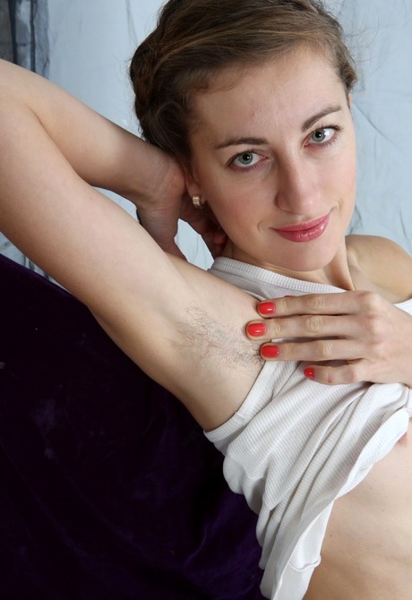 Skinny hairy babe Tais spreading furry pussy in closeup shots