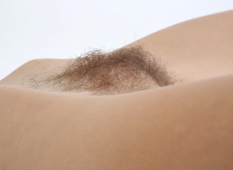 Flexible hairy amateur Tais showing her unshaved pussy - 15 of 16