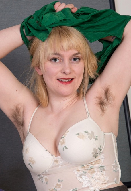 Teddy gets naughty and spreads her bush in an office chair