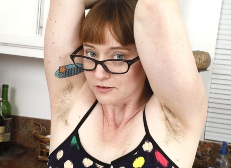 Nerdy babe Thelma gets naked to reveal her nice thick snatch - 2 of 16