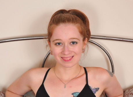 Cute teen Tracy gives a peak of her scary hairy crotch