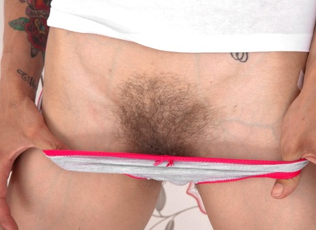 Slender Ursula pulls down her panties to show her hot snatch - 10 of 16