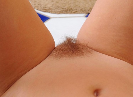 Blonde Valerie spreads her hairy pussylips and takes a piss - 6 of 15