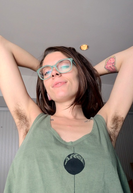 Nerdy hottie Valkyree shows off her happy trail and big bush - 2 of 16