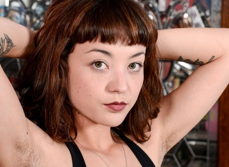 Exotic babe Willow shares her curvy tattooed body and snatch