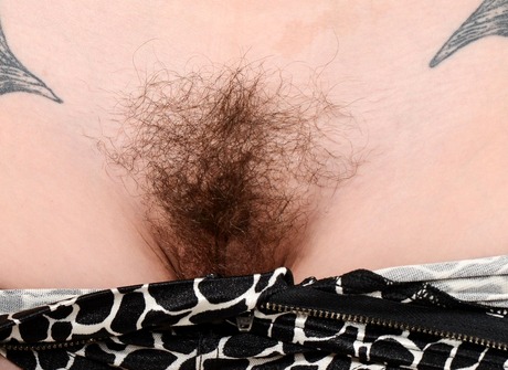 Exotic babe Willow shows her tattooes and hot untamed beaver - 4 of 16