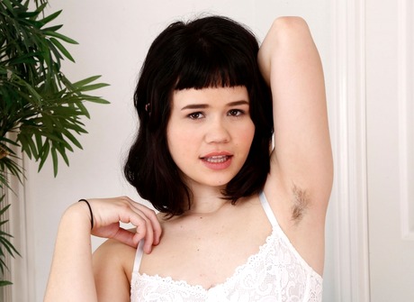 Petite Yhivi reveals her furry crotch and fingers her ass - 2 of 16