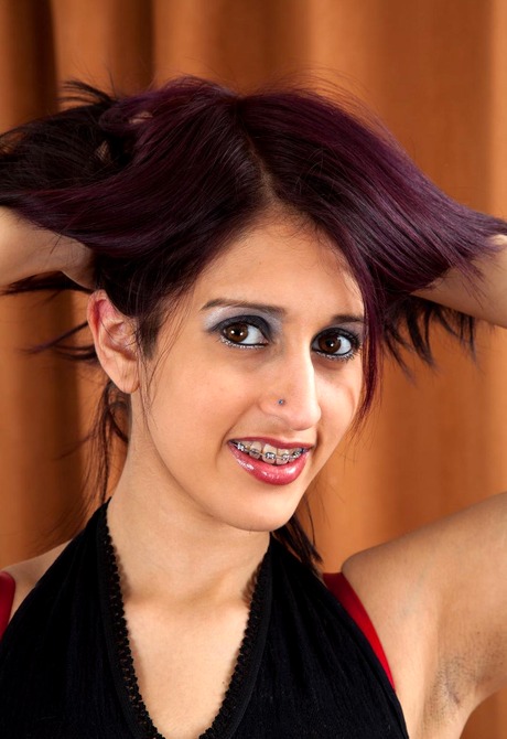Exotic Zarina pulls off her panties and spreads hairy bush