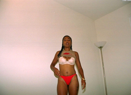 Natural ebony amateur Michelle fingering hairy pussy in bedroom - 3 of 16