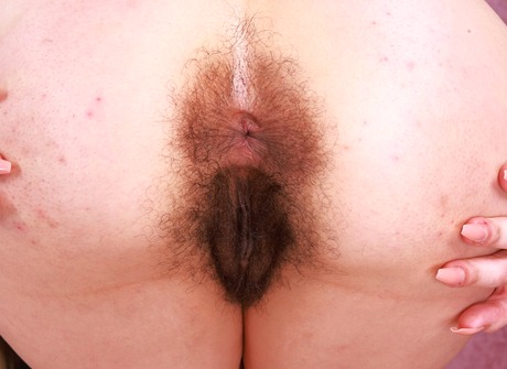 Sexy Zoey Jpeg takes down her fishnet dress, exhibiting hairy bush - 10 of 16