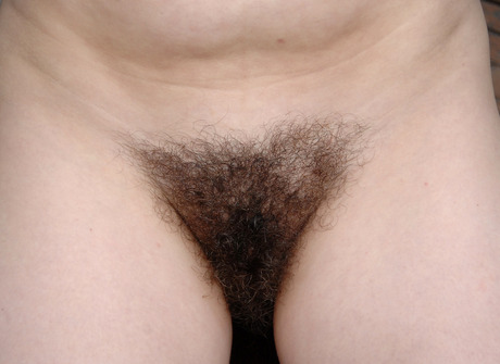 Natural amateur Ann showing hairy pussy outdoors - 7 of 16