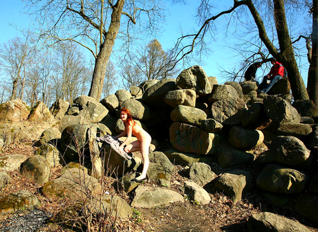 Redhead amateur Passion showing furry pussy outdoors