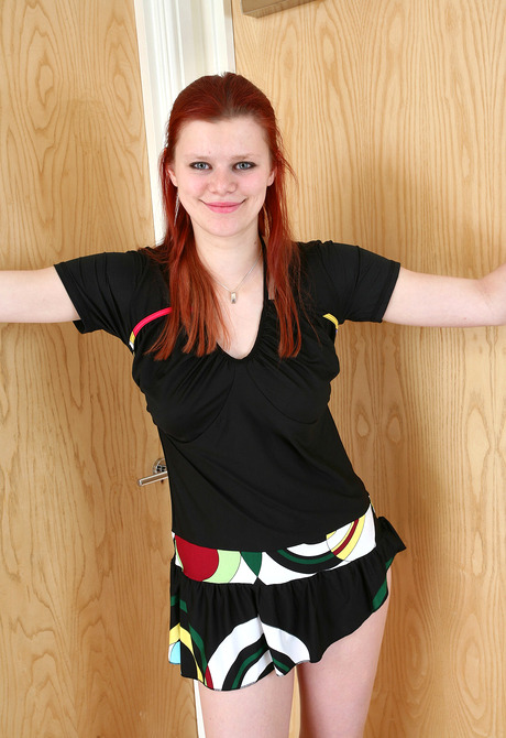 Hairy redhead Benji showing muff in see-thru panties