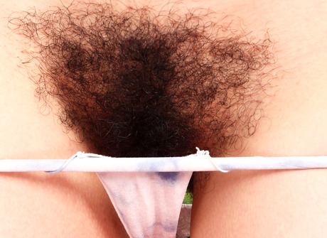 Zoey Jpeg teasing in bikini and revealing hairy pussy on patio