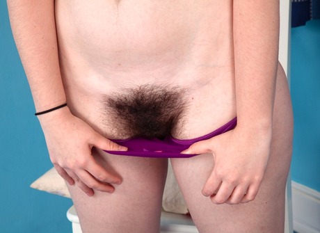 Chubby natural amateur Beryl showing off her hairy pussy - 4 of 16