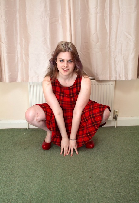 Chubby amateur Zoe stripping and showing hairy pussy