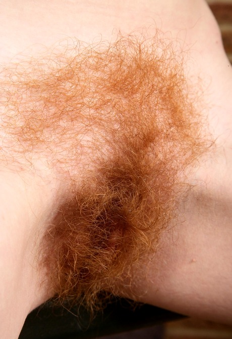 Hairy redhead amateur Ana Molly teasing while working out