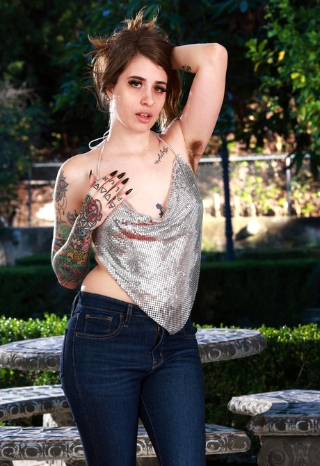 Scary hairy amateur Pearl Sage takes of jeans and spreads outdoors