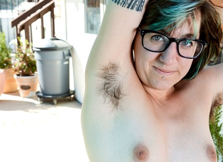 Nerdy brunette Anika flaunts her hairy pits legs and snatch - 4 of 16