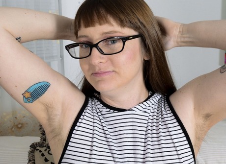 Nerdy babe Thelma shares her very hairy crotch in her room - 2 of 16