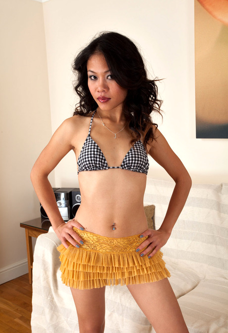 Stunning Asian Kimmi spreads hairy pussy while wearing high heels - 3 of 16