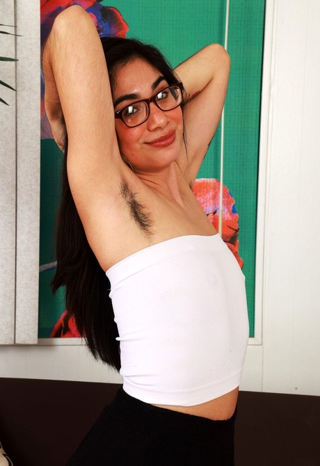 Hairy mature babe Lucy Sunflower teasing and spreading muff - 4 of 16