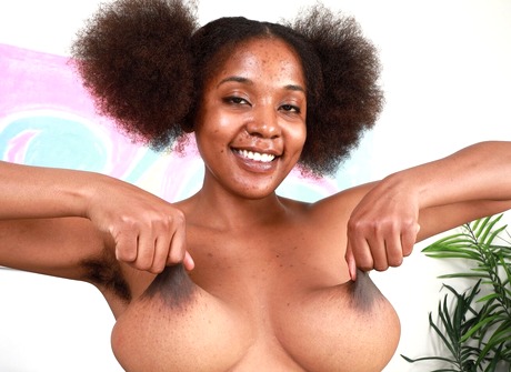 Chubby ebony amateur Panreece flaunting giant natural tits and hairy pussy - 9 of 16