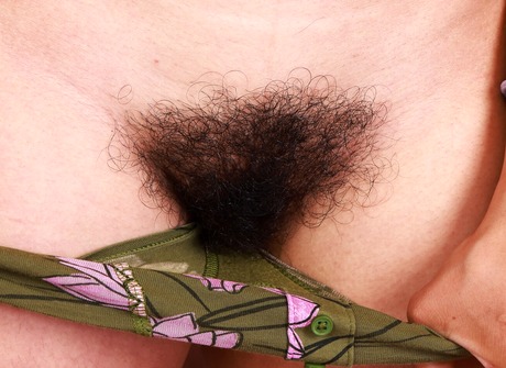 Blonde babe Natasha Karu reveals perky tits with tan lines before showing off hairy pussy - 8 of 16