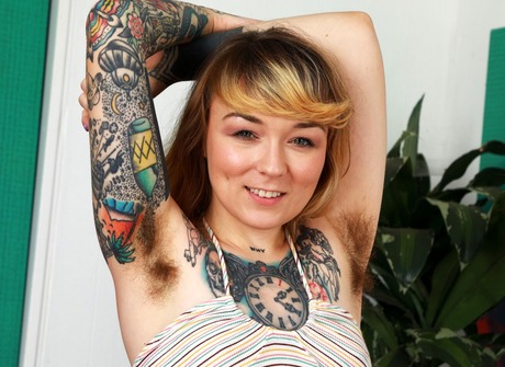 Scary hairy amateur Felicia Fisher revealing tattooed natural body