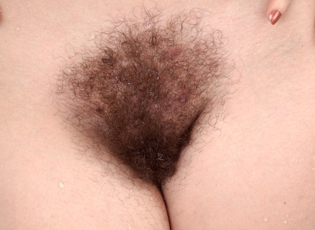 Anna May stips down in the bathroom showing her pussy in bathtub - 15 of 16