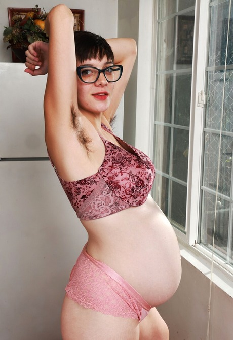 Mature hairy amateur Wookie Princess showing pregnant belly and spreading - 9 of 16