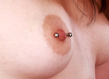 Dria Submits takes off her lovely dress showing pierced nipples - 11 of 16