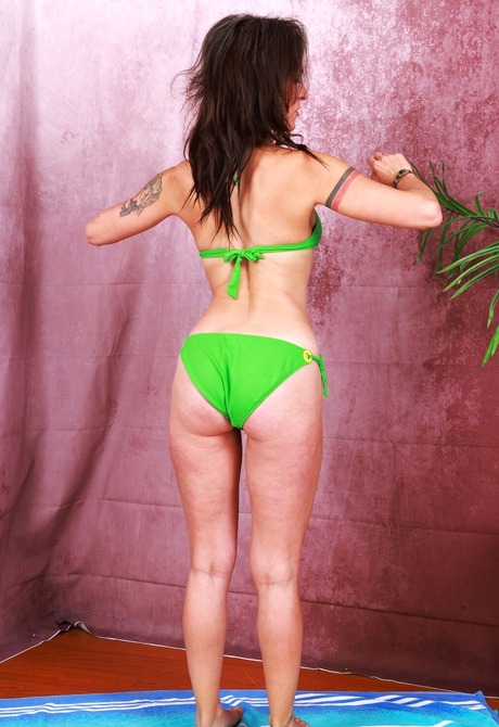 Mature hairy babe Delta Hauser teasing in bikini